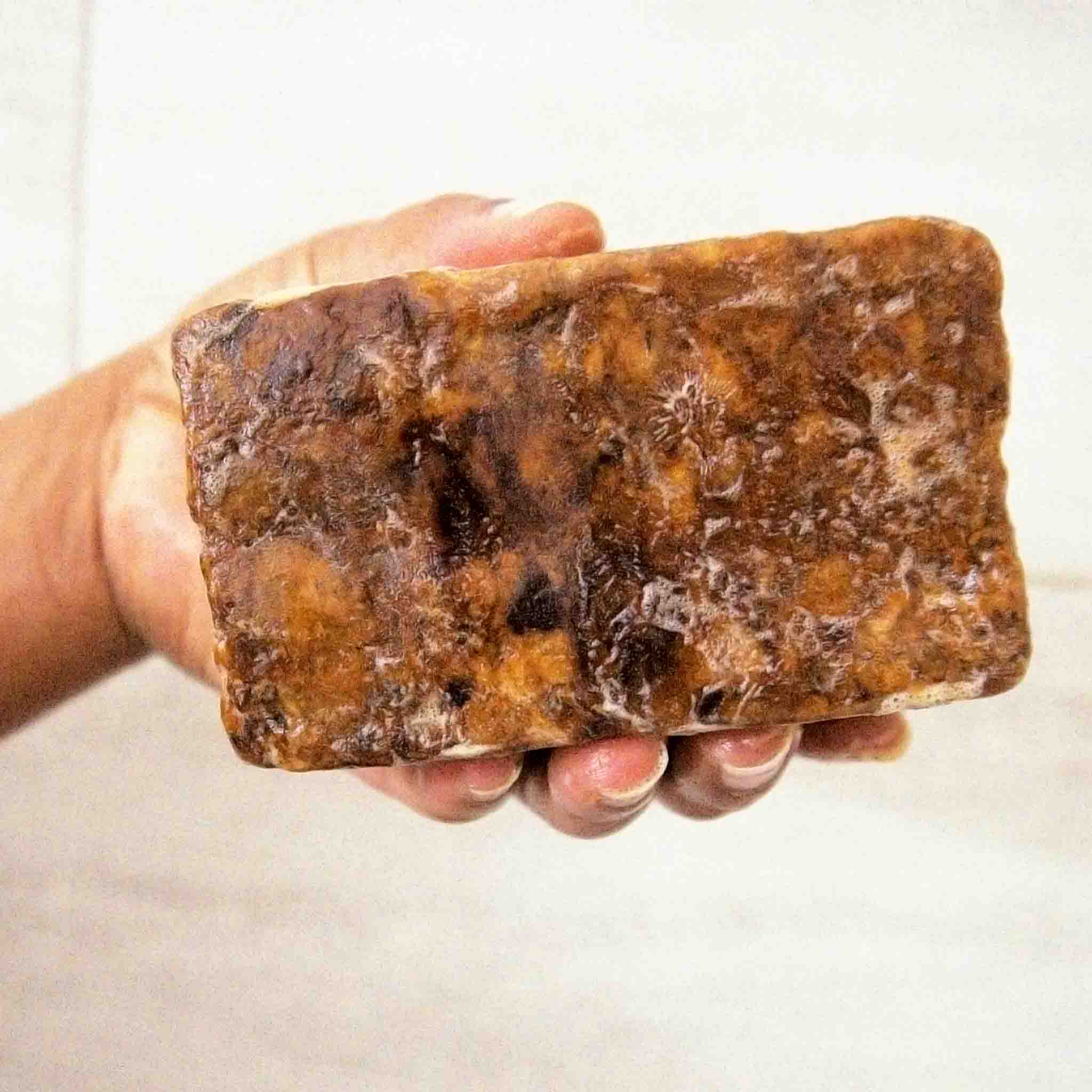 Authentic African Black Soap Bar, handmade with raw plantain skins, cocoa pod ash, and shea butter for deep cleansing, acne control, and hyperpigmentation treatment