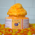 ndulge in a playful burst of Halloween magic with our Candy Corn Foaming Sugar Scrub! This gentle exfoliator is packed with sugar crystals to buff away dull skin, while transforming into a creamy foam that leaves your skin feeling soft, smooth, and refreshed.