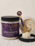 Duma Mbili Chebe Hair Butter with a spoonful of butter on a neutral background