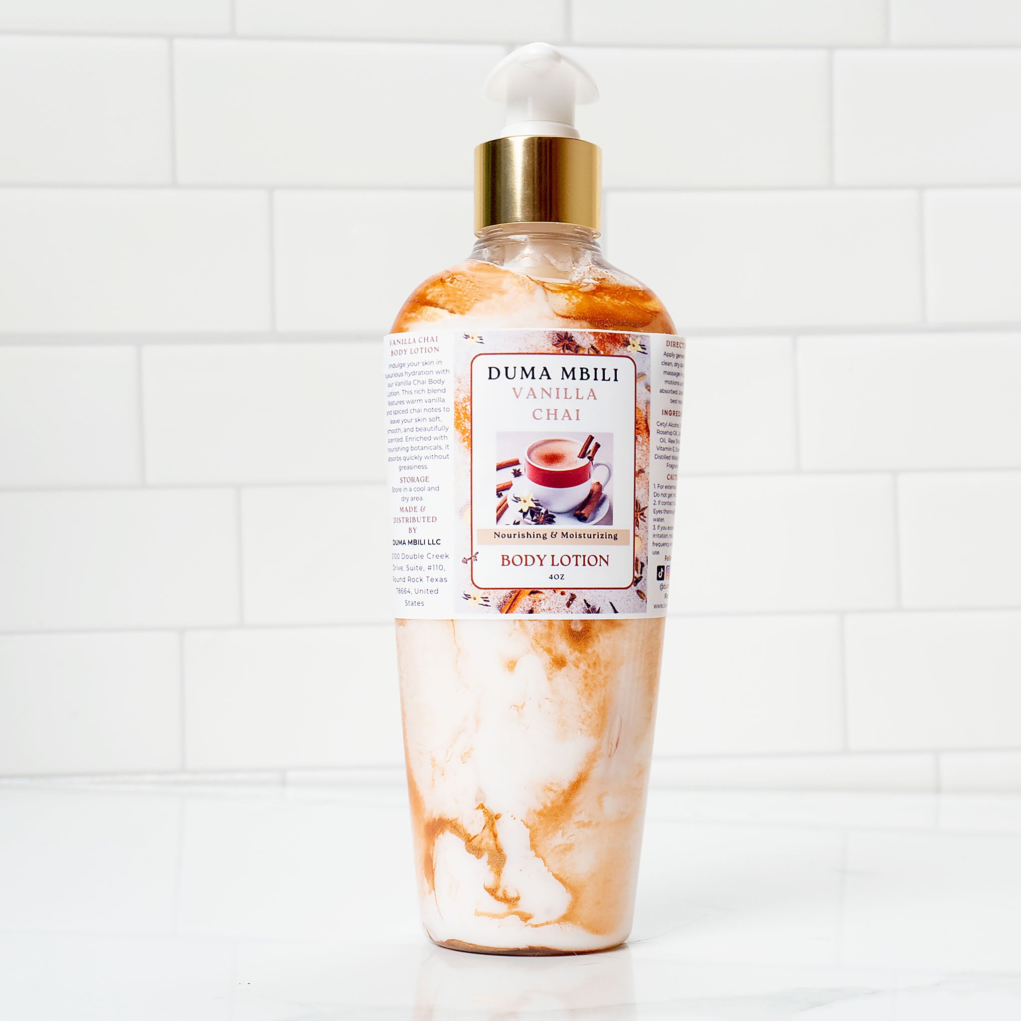 A bottle of Vanilla Chai Body Lotion with a rich, creamy formula, infused with warm vanilla, cinnamon, and cardamom for deep hydration.